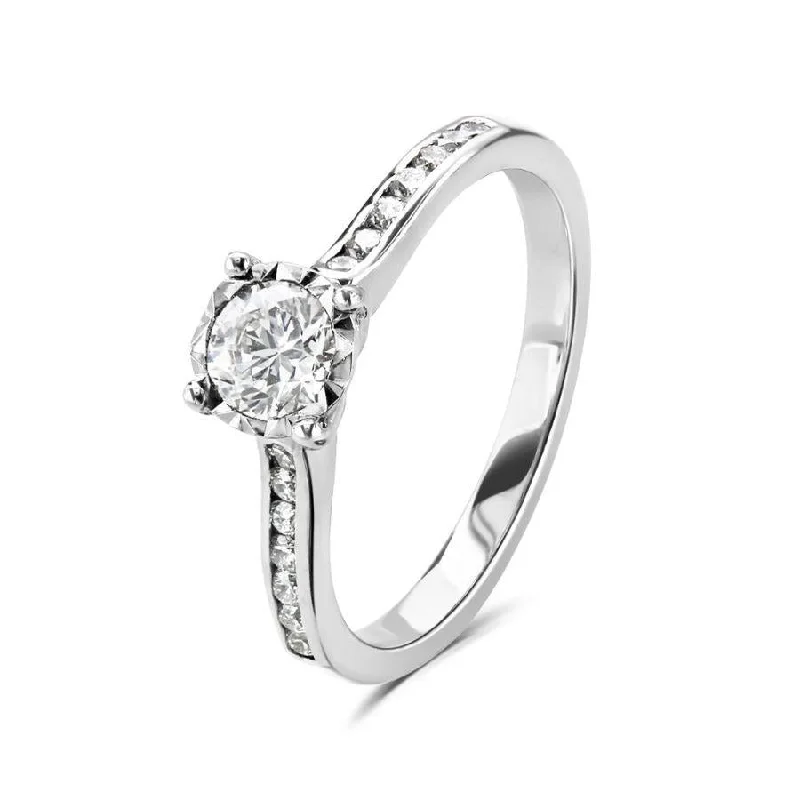 18ct white gold illusion set solitaire Diamond ring with channel set Diamond shoulders