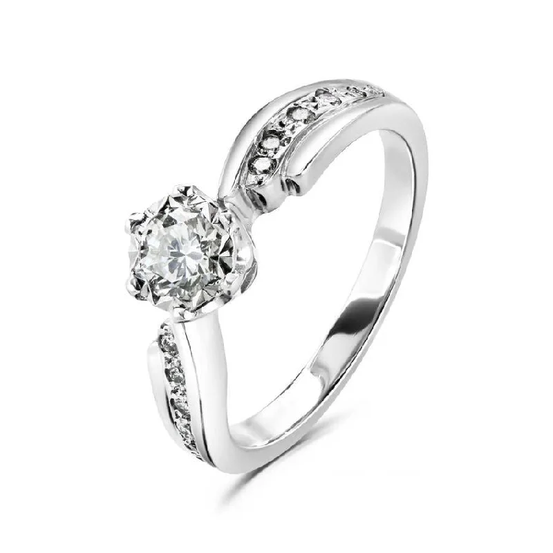 18ct white gold illusion set solitaire Diamond ring with channel set Diamond shoulders