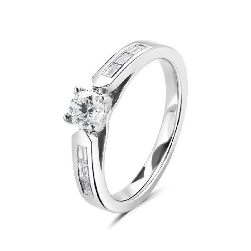 Platinum brilliant cut diamond ring with diamond set shoulders