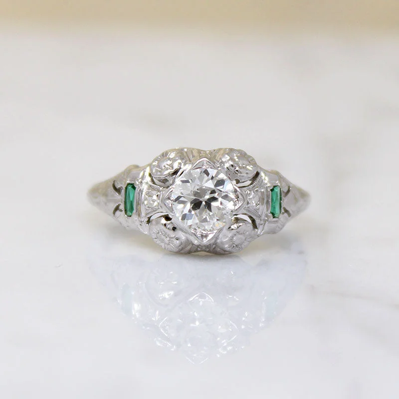 Fresh Floral Art Deco Diamond Ring with Emerald Accents